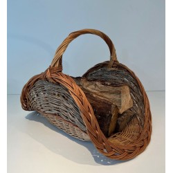 Rattan Wicker Log Basket of Boat Form with Arched Carrying Handle. France. Circa 1970.
