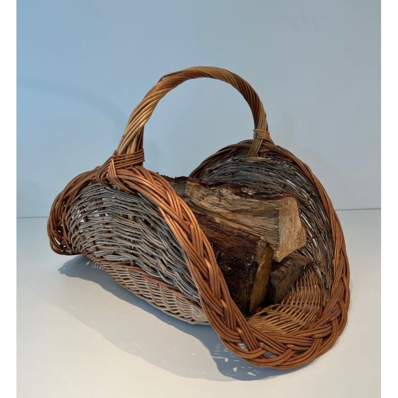 Rattan Wicker Log Basket of Boat Form with Arched Carrying Handle. France. Circa 1970.