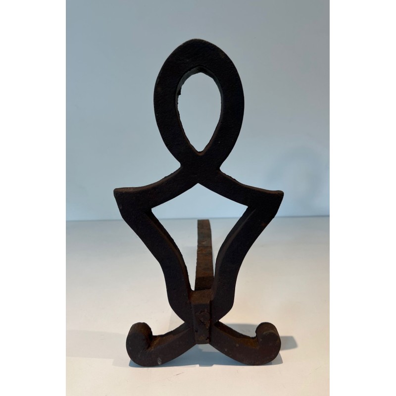 Pair of Modernist Cast Iron Andirons with Stylised Figural Uprights, by Raymond Subes. France. Circa 1940.