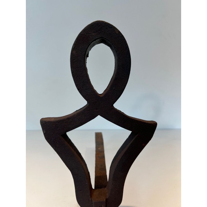 Pair of Modernist Cast Iron Andirons with Stylised Figural Uprights, by Raymond Subes. France. Circa 1940.