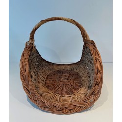 Rattan Wicker Log Basket of Boat Form with Arched Carrying Handle. France. Circa 1970.