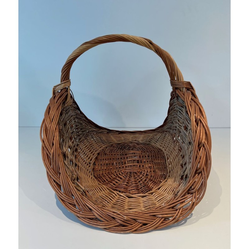 Rattan Wicker Log Basket of Boat Form with Arched Carrying Handle. France. Circa 1970.
