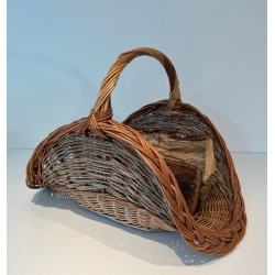 Rattan Wicker Log Basket of Boat Form with Arched Carrying Handle. France. Circa 1970.