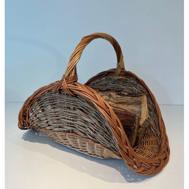 Rattan Wicker Log Basket of Boat Form with Arched Carrying Handle. France. Circa 1970.