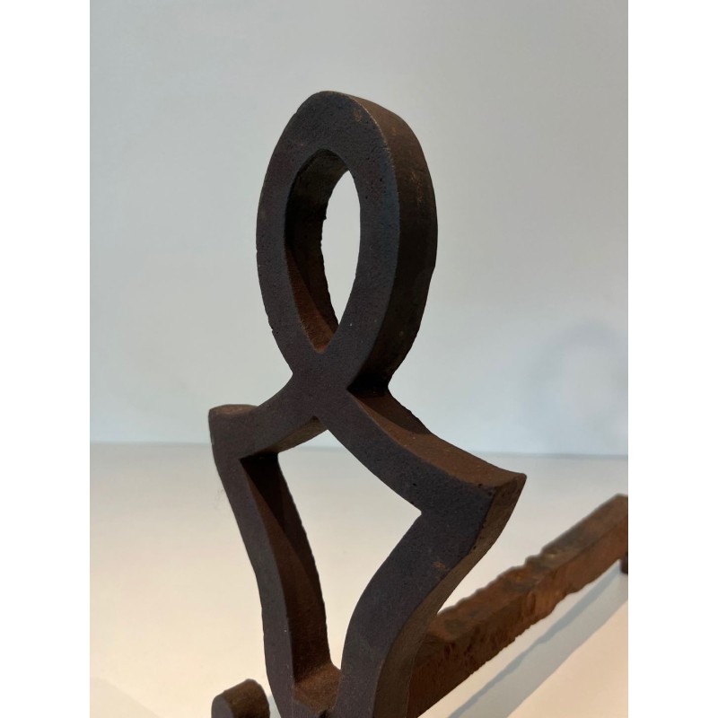 Pair of Modernist Cast Iron Andirons with Stylised Figural Uprights, by Raymond Subes. France. Circa 1940.