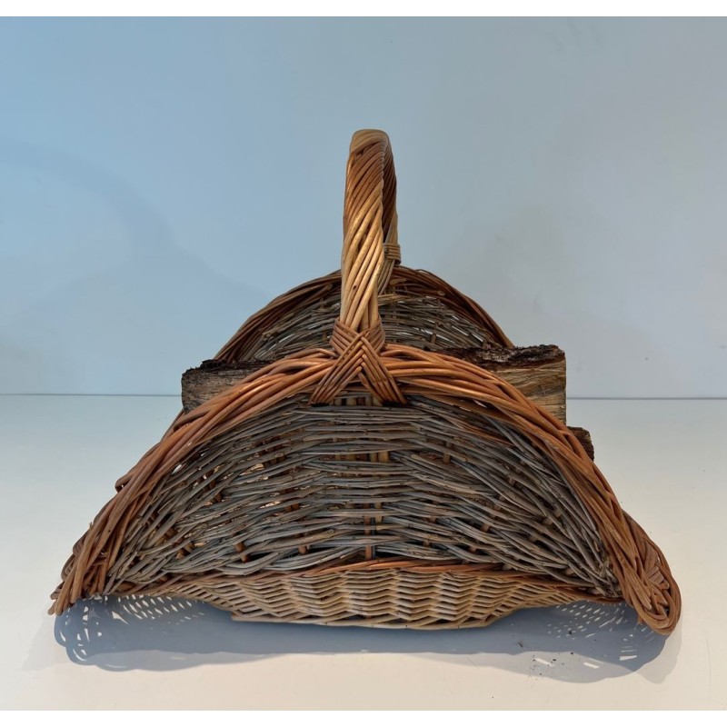 Rattan Wicker Log Basket of Boat Form with Arched Carrying Handle. France. Circa 1970.