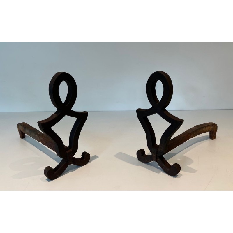 Pair of Modernist Cast Iron Andirons with Stylised Figural Uprights, by Raymond Subes. France. Circa 1940.