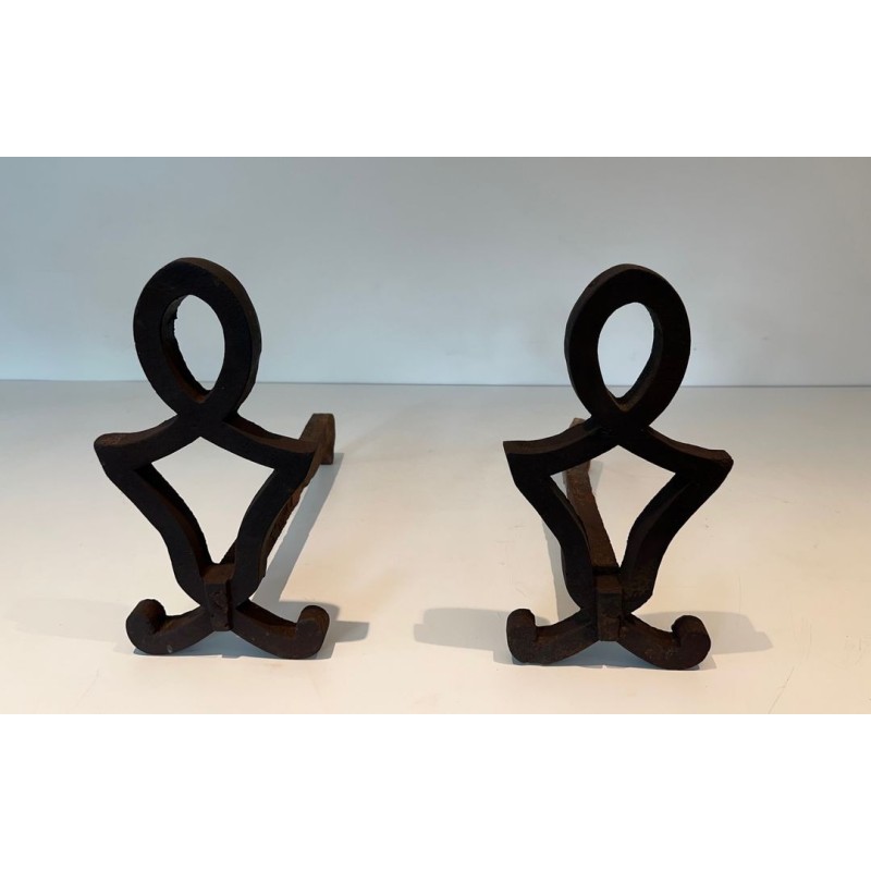 Pair of Modernist Cast Iron Andirons with Stylised Figural Uprights, by Raymond Subes. France. Circa 1940.