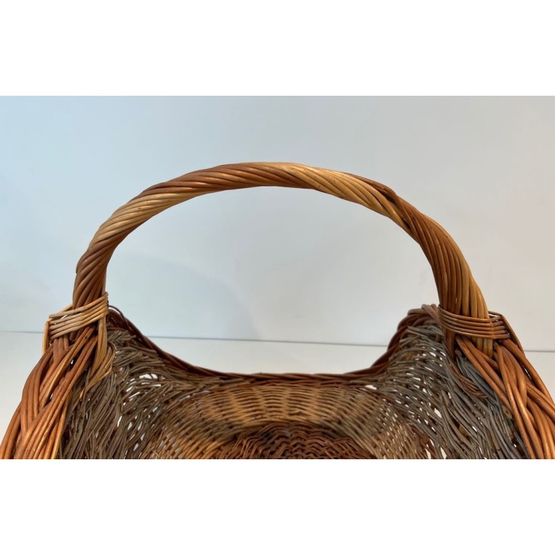 Rattan Wicker Log Basket of Boat Form with Arched Carrying Handle. France. Circa 1970.