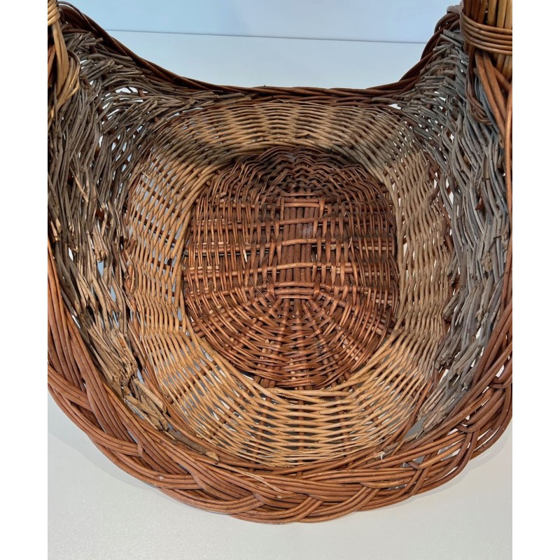 Rattan Wicker Log Basket of Boat Form with Arched Carrying Handle. France. Circa 1970.