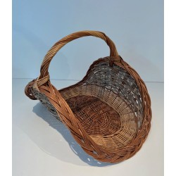 Rattan Wicker Log Basket of Boat Form with Arched Carrying Handle. France. Circa 1970.