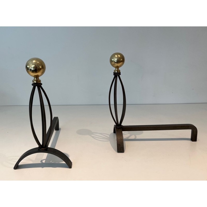 Pair of Modernist Wrought Iron and Brass Andirons with Ball Finials and Oval Cage Uprights. France. Circa 1970.