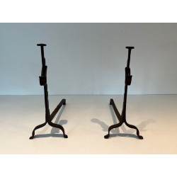 Pair of Wrought Iron Andirons with Ratchet Uprights and Tripod Bases. France. Circa 1900.