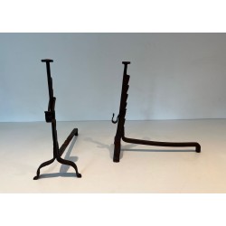Pair of Wrought Iron Andirons with Ratchet Uprights and Tripod Bases. France. Circa 1900.
