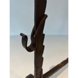 Pair of Wrought Iron Andirons with Ratchet Uprights and Tripod Bases. France. Circa 1900.