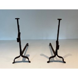 Pair of Wrought Iron Andirons with Ratchet Uprights and Tripod Bases. France. Circa 1900.