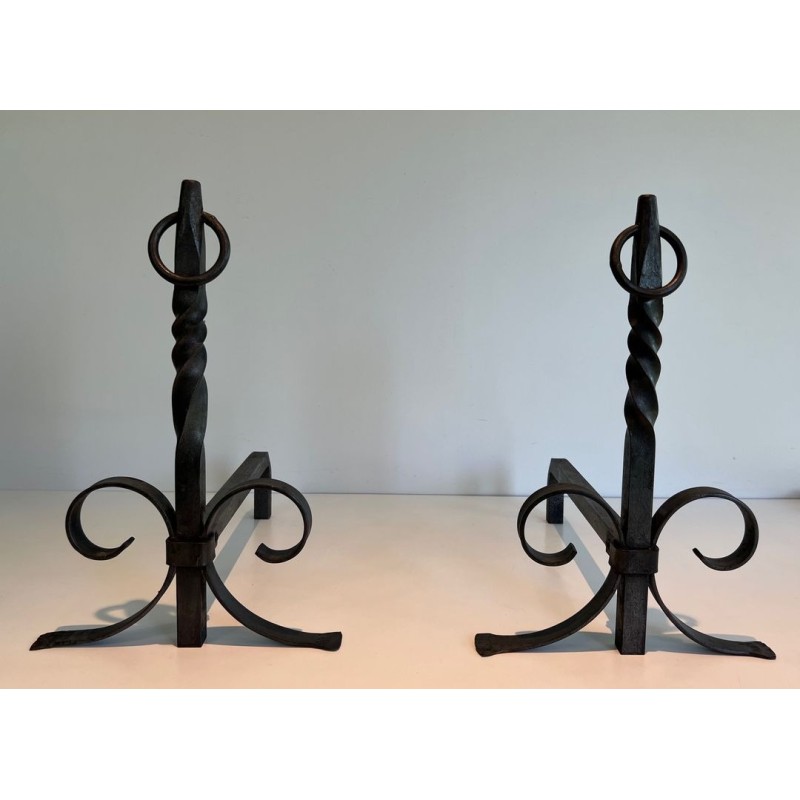 Pair of Neoclassical Wrought Iron Andirons with Twisted Column Uprights, Ring Finials and Scrolled Feet. France. Circa 1920.