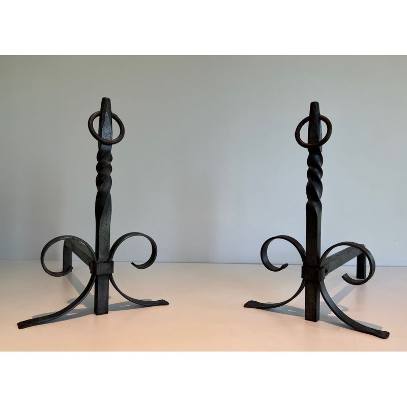 Pair of Neoclassical Wrought Iron Andirons with Twisted Column Uprights, Ring Finials and Scrolled Feet. France. Circa 1920.