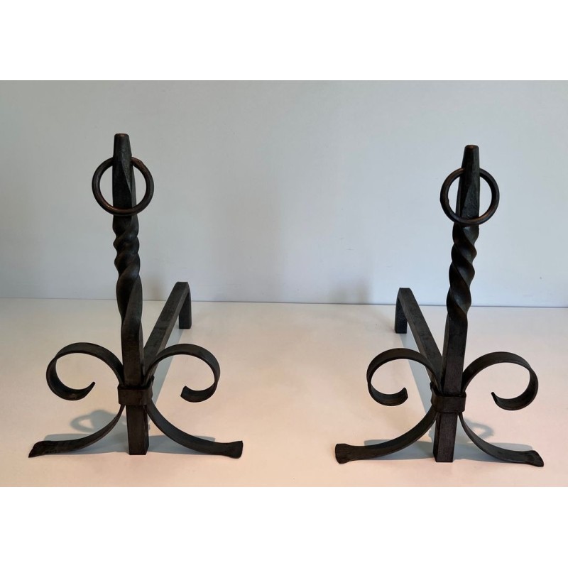 Pair of Neoclassical Wrought Iron Andirons with Twisted Column Uprights, Ring Finials and Scrolled Feet. France. Circa 1920.