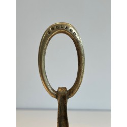 Pair of Neoclassical Bronze Andirons in the Form of Antique Oil Lamps with Oval Ring Finials. England. Circa 1960.