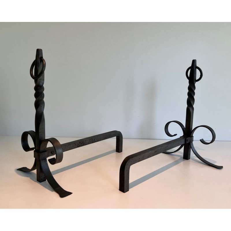 Pair of Neoclassical Wrought Iron Andirons with Twisted Column Uprights, Ring Finials and Scrolled Feet. France. Circa 1920.