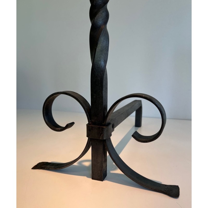 Pair of Neoclassical Wrought Iron Andirons with Twisted Column Uprights, Ring Finials and Scrolled Feet. France. Circa 1920.
