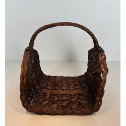 Rattan Wicker Log Basket with Arched Carrying Handle. France. Circa 1970.
