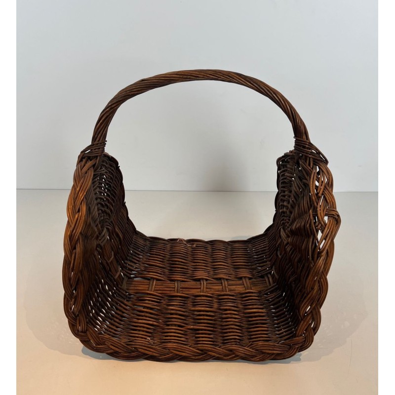 Rattan Wicker Log Basket with Arched Carrying Handle. France. Circa 1970.