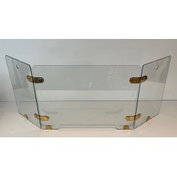 Three-Panel Clear Glass Folding Fireplace Screen with Oval Brass Hinge Plates. France. Circa 1970.