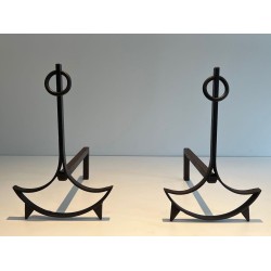 Pair of Wrought Iron Andirons with Ring Finials and Swept Crescent Bases. France. Circa 1940.