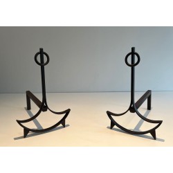 Pair of Wrought Iron Andirons with Ring Finials and Swept Crescent Bases. France. Circa 1940.