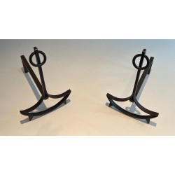 Pair of Wrought Iron Andirons with Ring Finials and Swept Crescent Bases. France. Circa 1940.