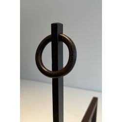 Pair of Wrought Iron Andirons with Ring Finials and Swept Crescent Bases. France. Circa 1940.