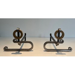 Pair of Modernist Andirons with Large Brass Ring Uprights and Chromed Steel Horseshoe Log Rests. France. Circa 1970.