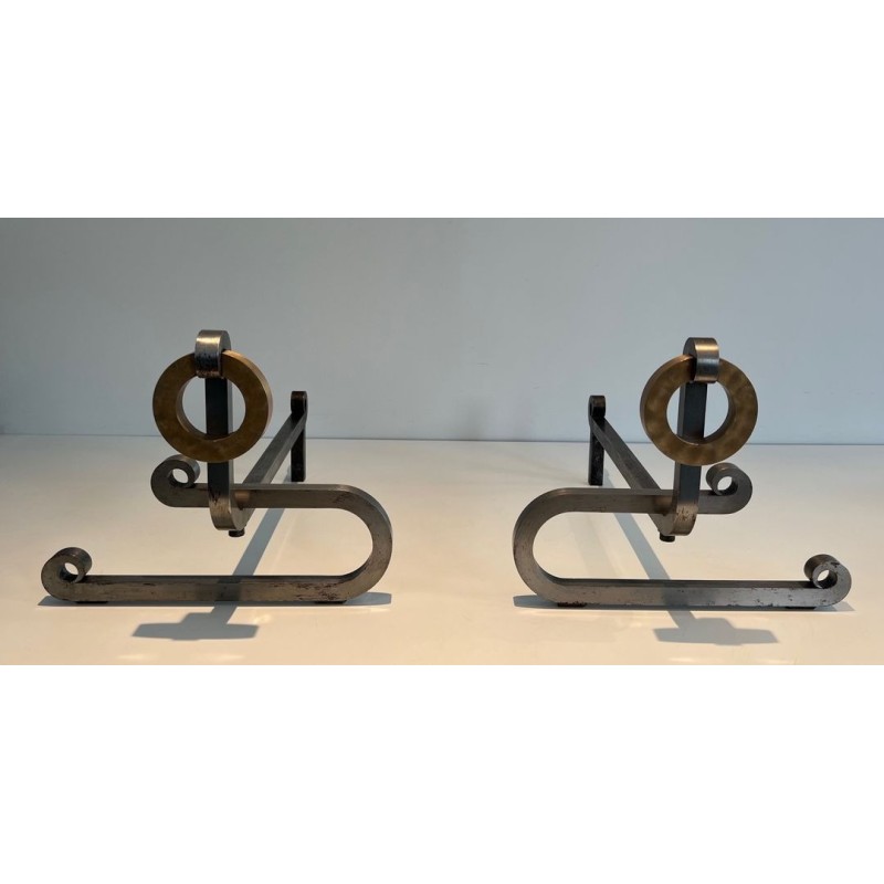 Pair of Modernist Andirons with Large Brass Ring Uprights and Chromed Steel Horseshoe Log Rests. France. Circa 1970.