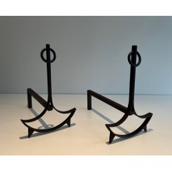 Pair of Wrought Iron Andirons with Ring Finials and Swept Crescent Bases. France. Circa 1940.