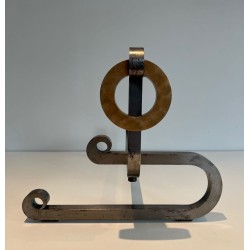 Pair of Modernist Andirons with Large Brass Ring Uprights and Chromed Steel Horseshoe Log Rests. France. Circa 1970.