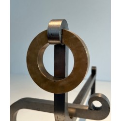 Pair of Modernist Andirons with Large Brass Ring Uprights and Chromed Steel Horseshoe Log Rests. France. Circa 1970.