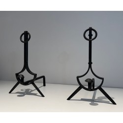 Pair of Modernist Wrought Iron Andirons with Ring Finials and Splayed Tripod Bases. France. Circa 1940.