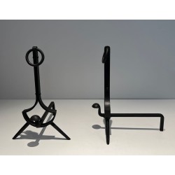 Pair of Modernist Wrought Iron Andirons with Ring Finials and Splayed Tripod Bases. France. Circa 1940.