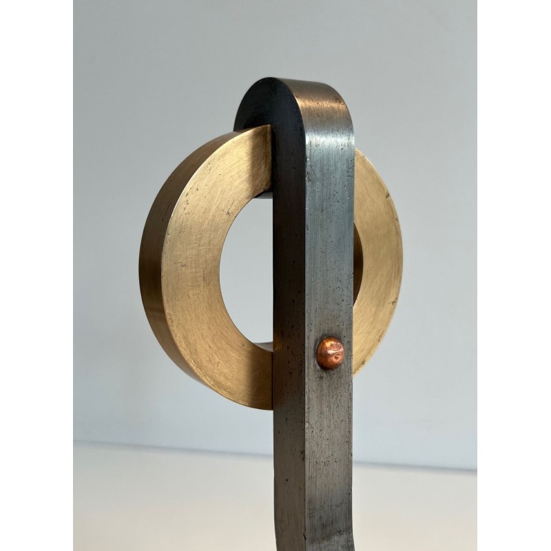 Pair of Modernist Andirons with Large Brass Ring Uprights and Chromed Steel Horseshoe Log Rests. France. Circa 1970.