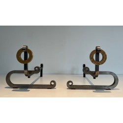 Pair of Modernist Andirons with Large Brass Ring Uprights and Chromed Steel Horseshoe Log Rests. France. Circa 1970.