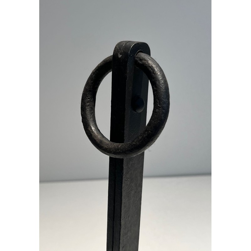 Pair of Modernist Wrought Iron Andirons with Ring Finials and Splayed Tripod Bases. France. Circa 1940.