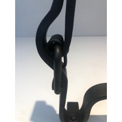 Pair of Wrought Iron Andirons of "Ceinture" Belt Model. France. Circa 1950.