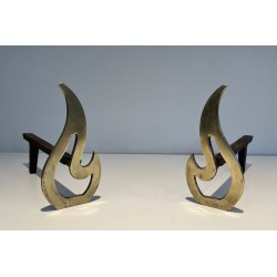 Pair of Brass Andirons with Sculptural Flame Uprights. France. Circa 1920.