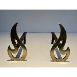 Pair of Brass Andirons with Sculptural Flame Uprights. France. Circa 1920.