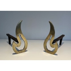 Pair of Brass Andirons with Sculptural Flame Uprights. France. Circa 1920.