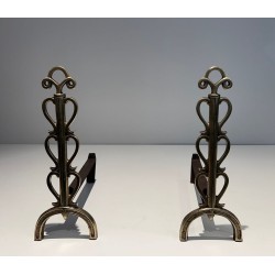 Pair of Brass and Wrought Iron Andirons with Stacked Heart-Lobe Uprights in the Manner of Raymond Subes. France. Circa 1940.