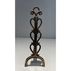 Pair of Brass and Wrought Iron Andirons with Stacked Heart-Lobe Uprights in the Manner of Raymond Subes. France. Circa 1940.