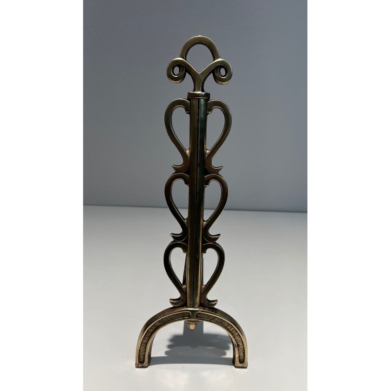 Pair of Brass and Wrought Iron Andirons with Stacked Heart-Lobe Uprights in the Manner of Raymond Subes. France. Circa 1940.